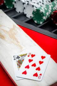 kartel4d mobile app interface showing live-dealer casino tables and sportsbook odds